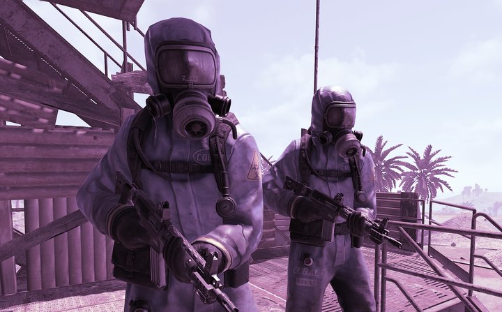 Two Cobalt scientists in hazmat suits guarding a monument walkway